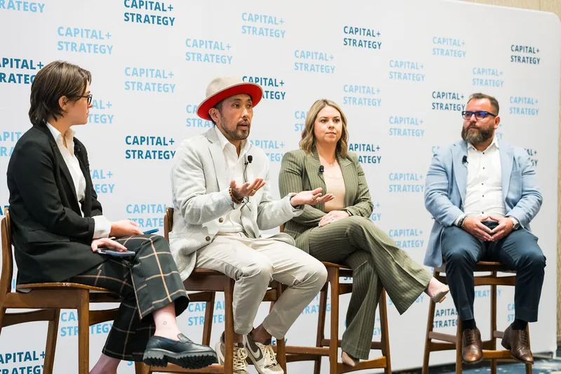 The Capital+Strategy panel in Orlando, Steven F. Gonzalez at the right in a light blue blazer